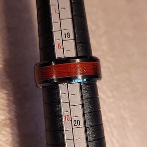 Black ring w/wood inlay.